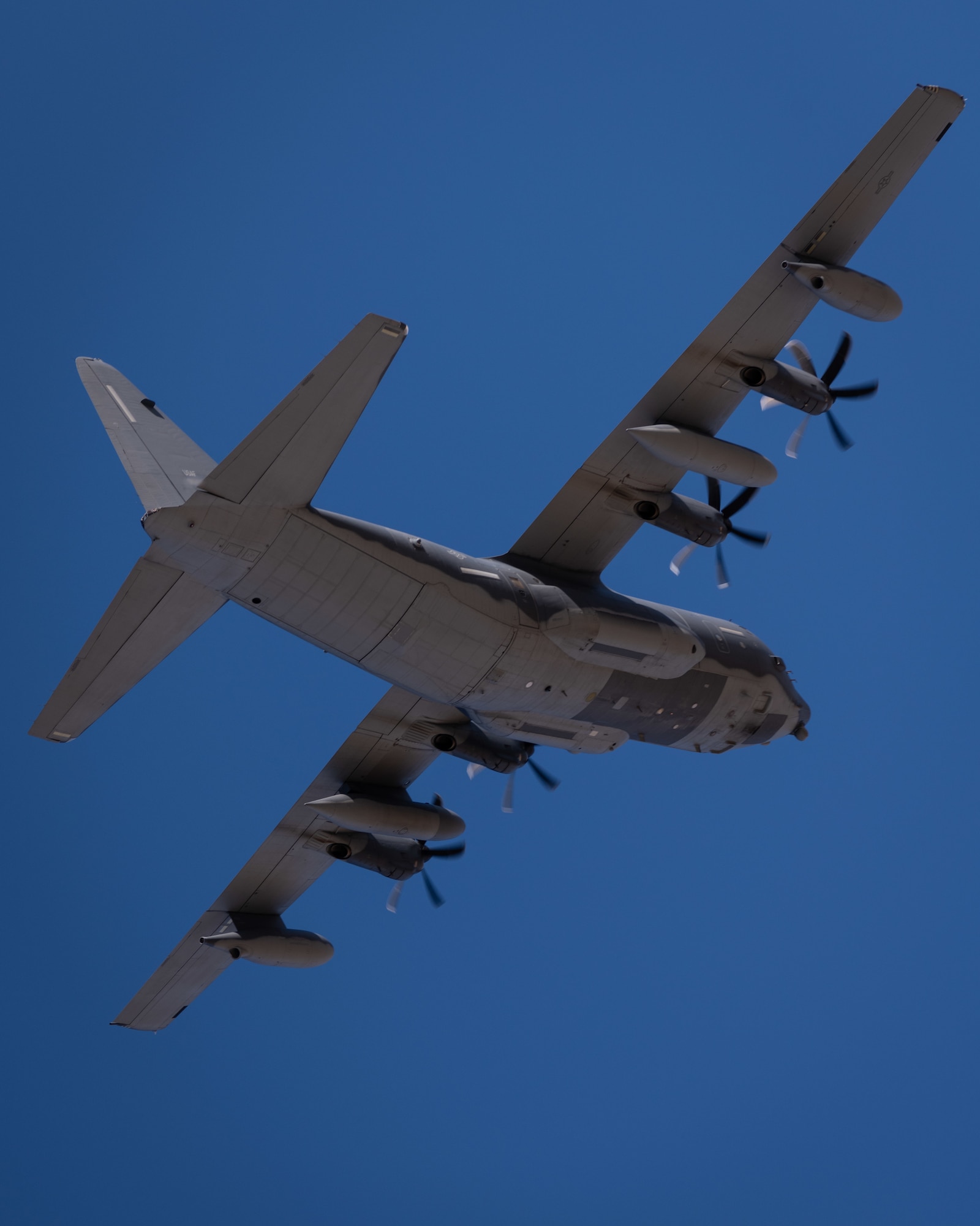 An MC-130J Commando II aircraft conducts a flyover before landing during Exercise Silent Arrow at Wendover, Utah, Oct. 29, 2021. Known as a validation exercise, Silent Arrow is the final part in a series of exercises designed to test the effectiveness of Air Force Special Operations Command's Mission Sustainment Team initiative. The MST pathfinding initiative pairs Airmen from 22 career fields to create small teams able to operate independent of main bases, by training them to use skill sets outside of their normal duties.