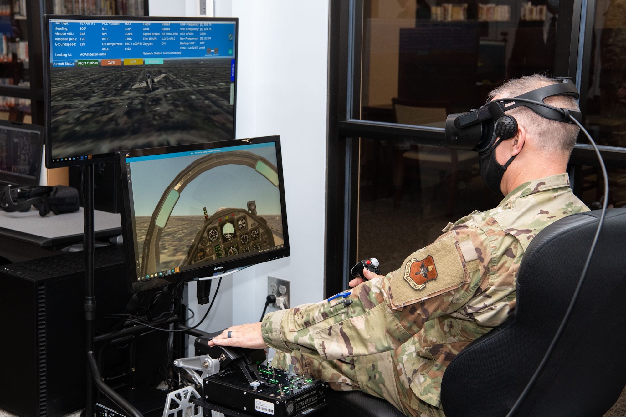 Maxwell AFB, Ala. - Air University Library and Immersive Learning and Simulation Research Task Force host a ribbon cutting for the new Pilot Training NEXT simulator October 28th 2021 in the Library’s Inovation Lab. (U.S. Air Force photo by William Birchfield)