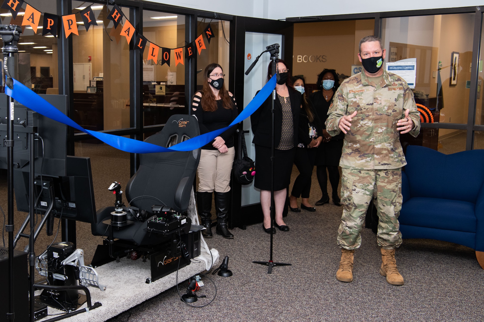 Maxwell AFB, Ala. - Air University Library and Immersive Learning and Simulation Research Task Force host a ribbon cutting for the new Pilot Training NEXT simulator October 28th 2021 in the Library’s Innovation Lab. (U.S. Air Force photo by William Birchfield)