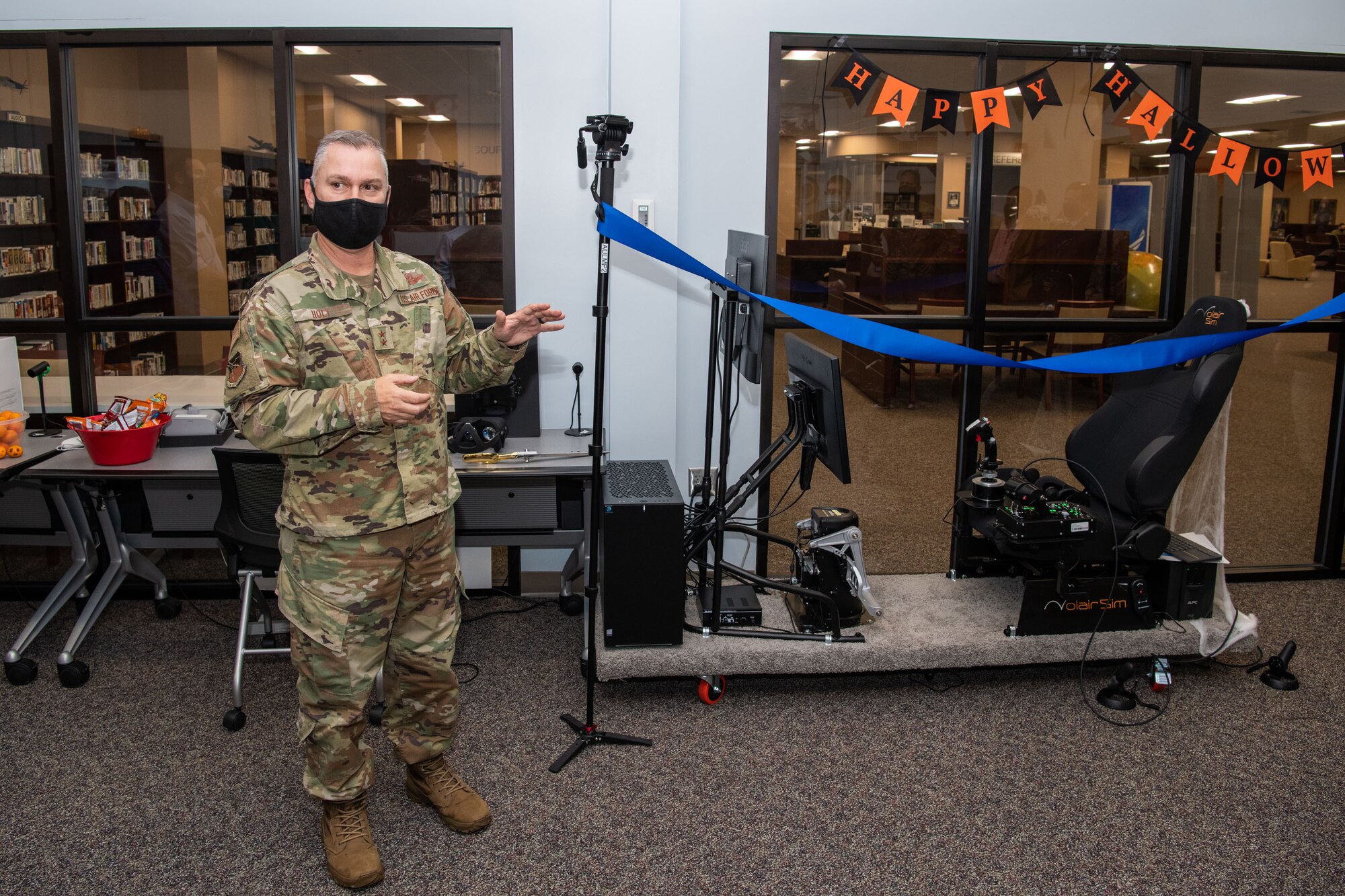 Maxwell AFB, Ala. - Air University Library and Immersive Learning and Simulation Research Task Force host a ribbon cutting for the new Pilot Training NEXT simulator October 28th 2021 in the Library’s Innovation Lab. (U.S. Air Force photo by William Birchfield)