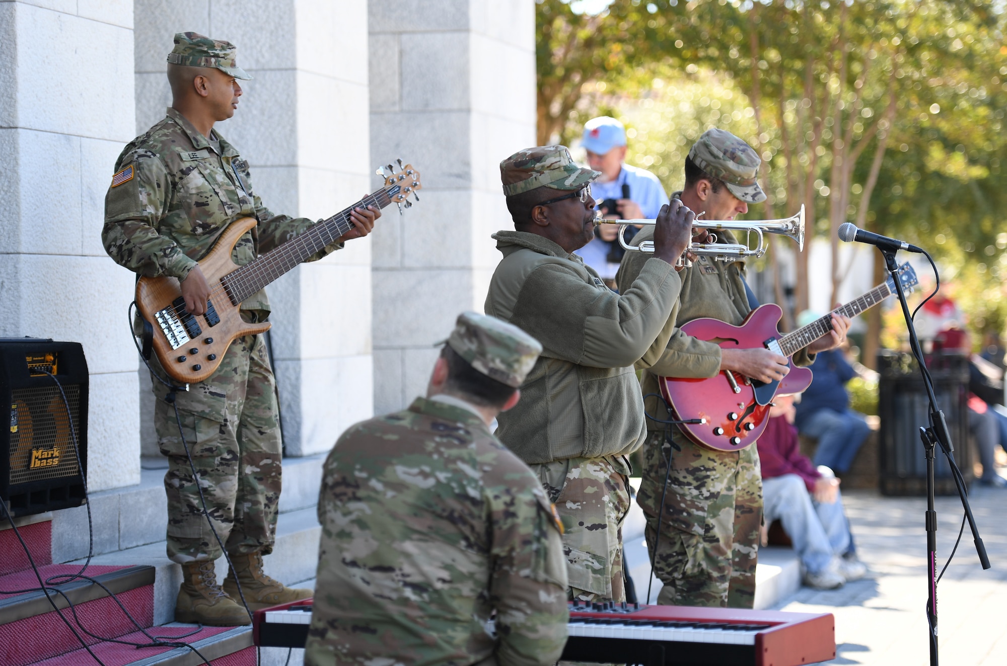 Members of the U.S. Army 41st Army Band perform during the 21st Annual Gulf Coast Veterans Day Parade in Biloxi, Mississippi, Nov. 6, 2021. Keesler Air Force Base leadership, along with hundreds of Airmen, attended and participated in the parade in support of all veterans, past and present. More than 50 unique floats, marching bands and military units marched in the largest Veterans Day parade on the Gulf Coast. (U.S. Air Force photo by Kemberly Groue)