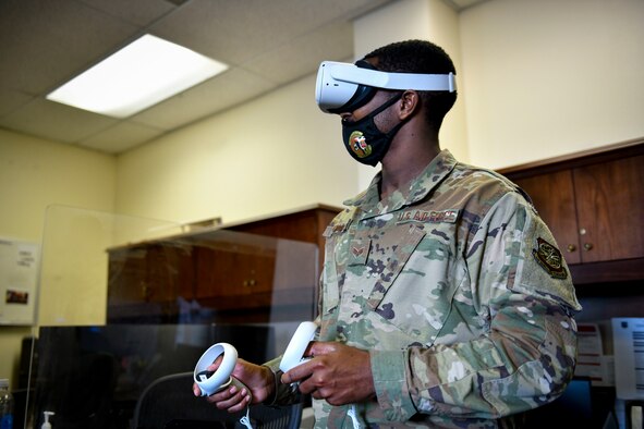 U.S. Air Force Senior Airman Farrell Thomas III, 92nd Comptroller Squadron command support staff, tests the new Sexual Assault Prevention and Response virtual reality training at Fairchild Air Force Base, Washington, Oct. 27, 2021. The SAPR VR training comes from Air Mobility Command, and is designed to provide Airmen a hands-on experience with a situation they may have never been exposed to. (U.S. Air Force photo by Senior Airman Ryan Gomez