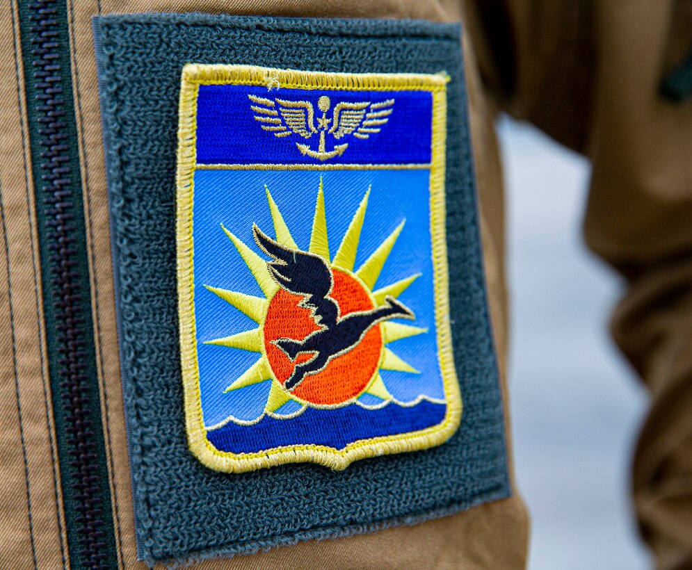 A member of the French Navy displays his unit’s patch on Marine Corps Air Station Futenma, Okinawa, Japan, Nov. 2, 2021.The arrival and departure of the aircraft on MCAS Futenma, one of the seven UNC-R bases in Japan, shows a continuous partnership between the UNC-R and the host nation. (U.S. Marine Corps photo by Lance Cpl. Alex Fairchild)