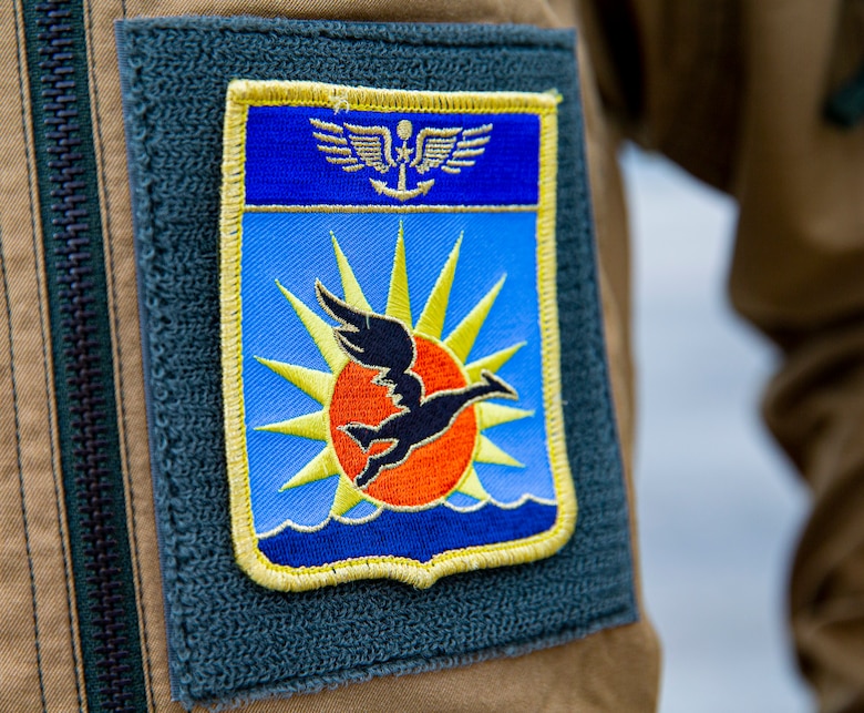 A member of the French Navy displays his unit’s patch on Marine Corps Air Station Futenma, Okinawa, Japan, Nov. 2, 2021.The arrival and departure of the aircraft on MCAS Futenma, one of the seven UNC-R bases in Japan, shows a continuous partnership between the UNC-R and the host nation. (U.S. Marine Corps photo by Lance Cpl. Alex Fairchild)