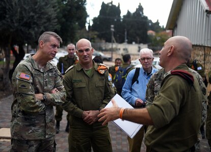 Army Gen. Daniel Hokanson, chief, National Guard Bureau, and Maj. Gen. Ori Gordin, Home Front Command commander, listen to a briefing during Hokanson's visit to Israel to reaffirm the National Guard Bureau's 15-year bilateral relationship with the HFC, Nov. 2, 2021.