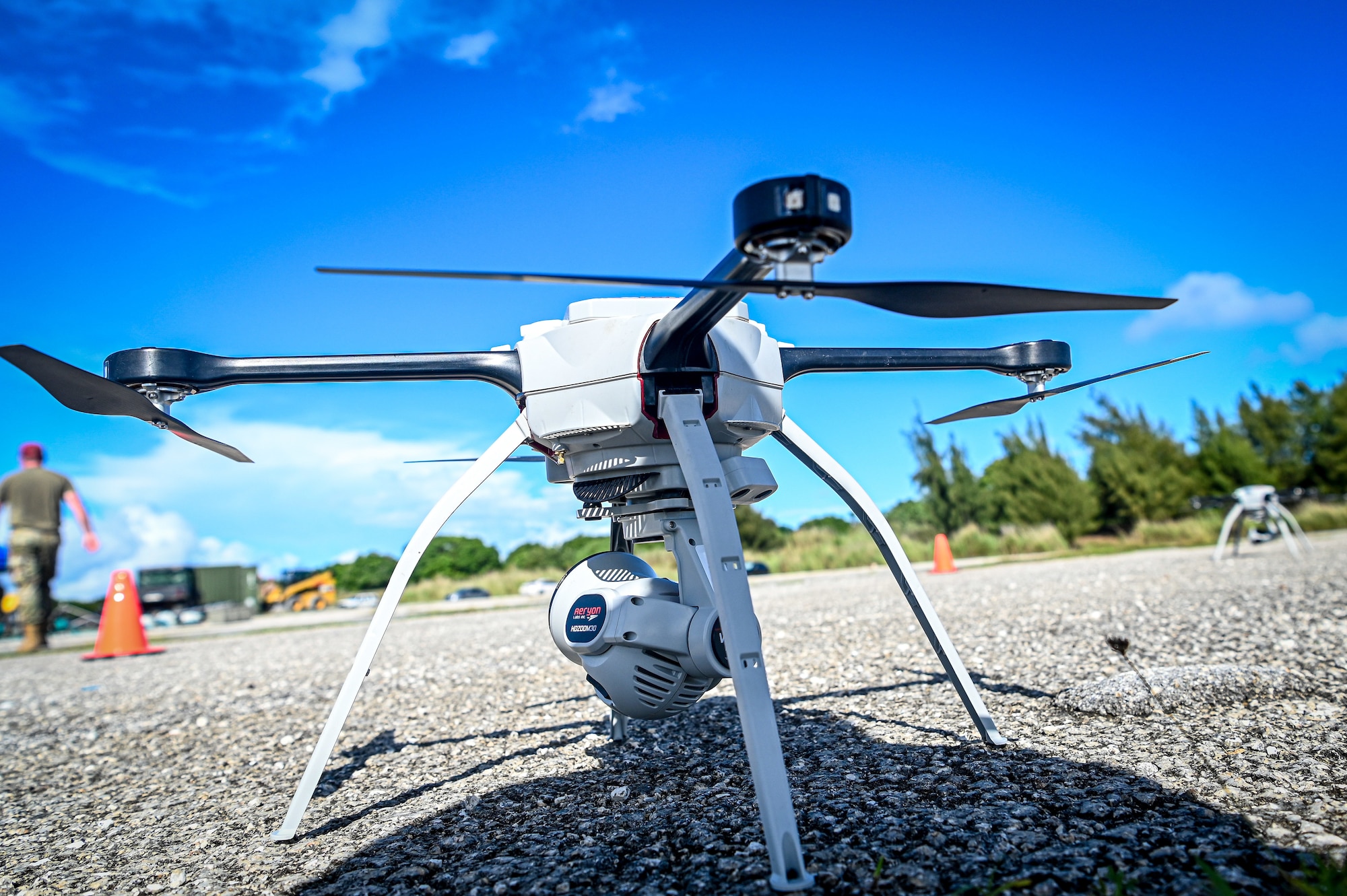 U.S. Air Force civil engineers fly a Small Unmanned Aircraft System during Rapid Airfield Damage Assessment System testing at Andersen Air Force Base, Guam, Nov. 5, 2021.