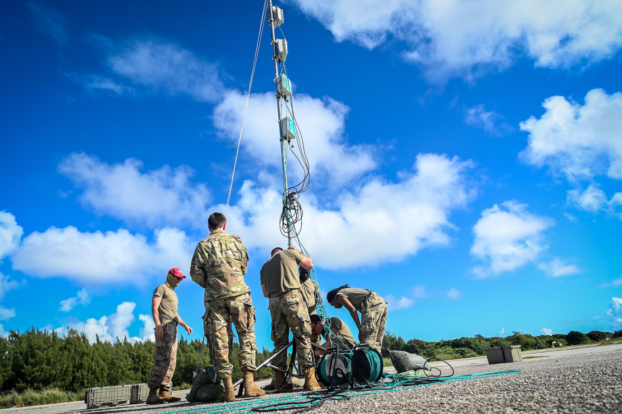 Airmen assigned to the 36th Civil Engineering Squadron and 544th Rapid Engineer Deployable Heavy Operational Repair Squadron Engineer assemble a Small Unmanned Aircraft System communication antenna during Rapid Airfield Damage Assessment System testing at Andersen Air Force Base, Guam, Nov. 5, 2021.