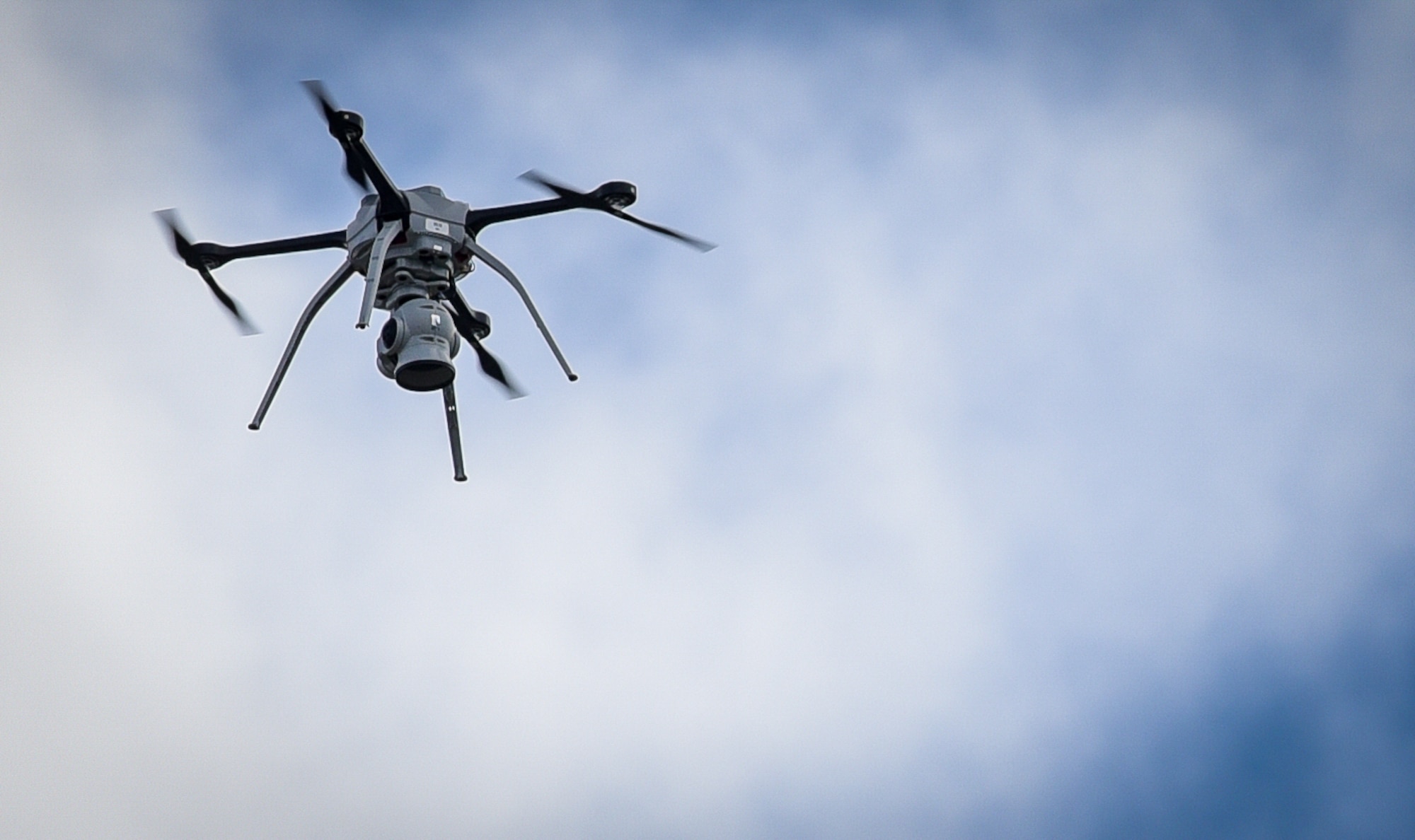 U.S. Air Force civil engineers fly a Small Unmanned Aircraft System during Rapid Airfield Damage Assessment System testing at Andersen Air Force Base, Guam, Nov. 5, 2021.