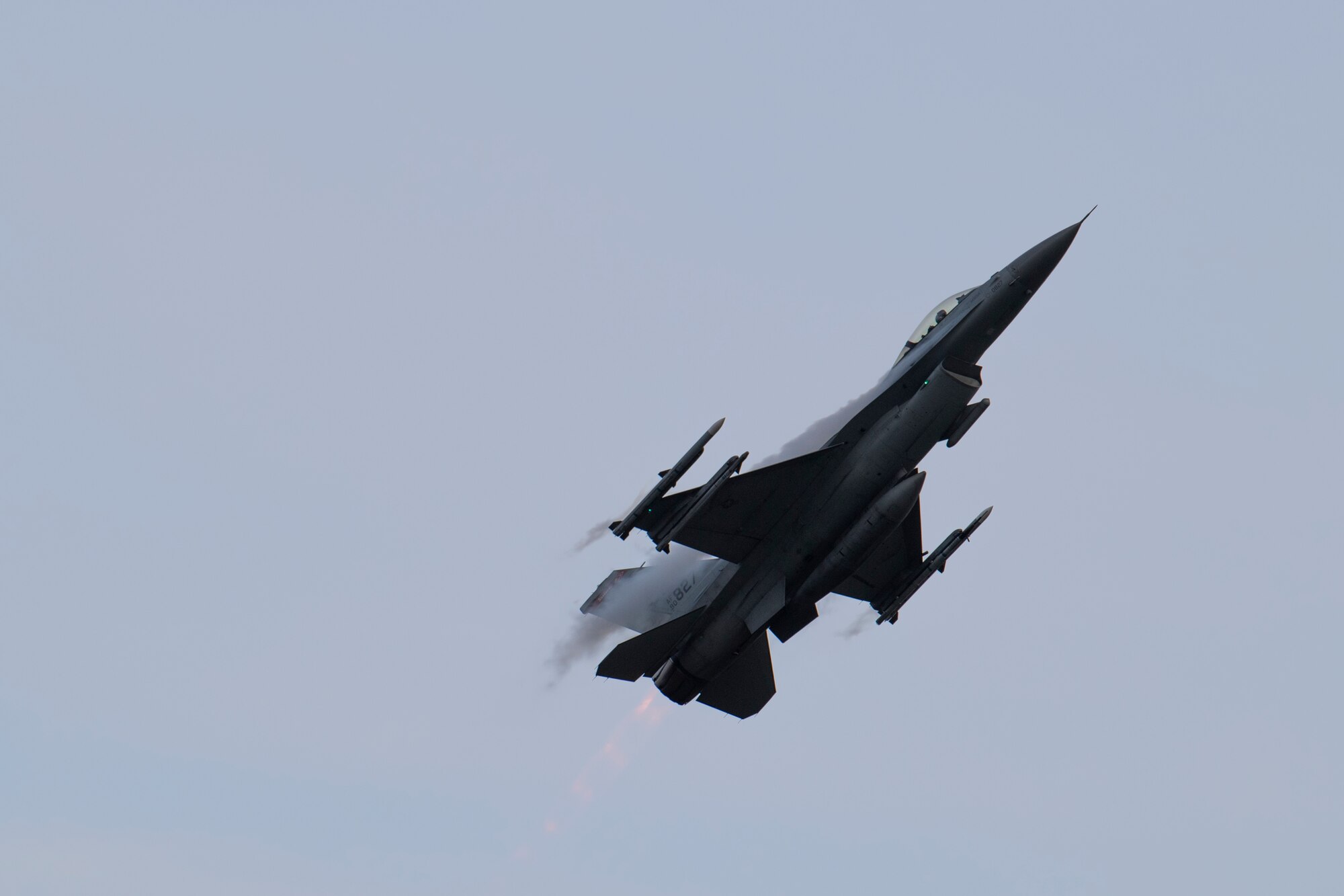 A U.S. Air Force F-16C Fighting Falcon fighter jet assigned to the 480th Fighter Squadron at Spangdahlem Air Base, Germany, takes off from a runway at Büchel Air Base, Germany, Nov. 4, 2021. F-16's from Spangdahlem integrated with the German Air Force Tornados during Castle Forge, a multinational, U.S. Air Forces in Europe-Air Forces Africa-wide Agile Combat Employment event. (U.S. Air Force Photo by Senior Airman Ali Stewart)