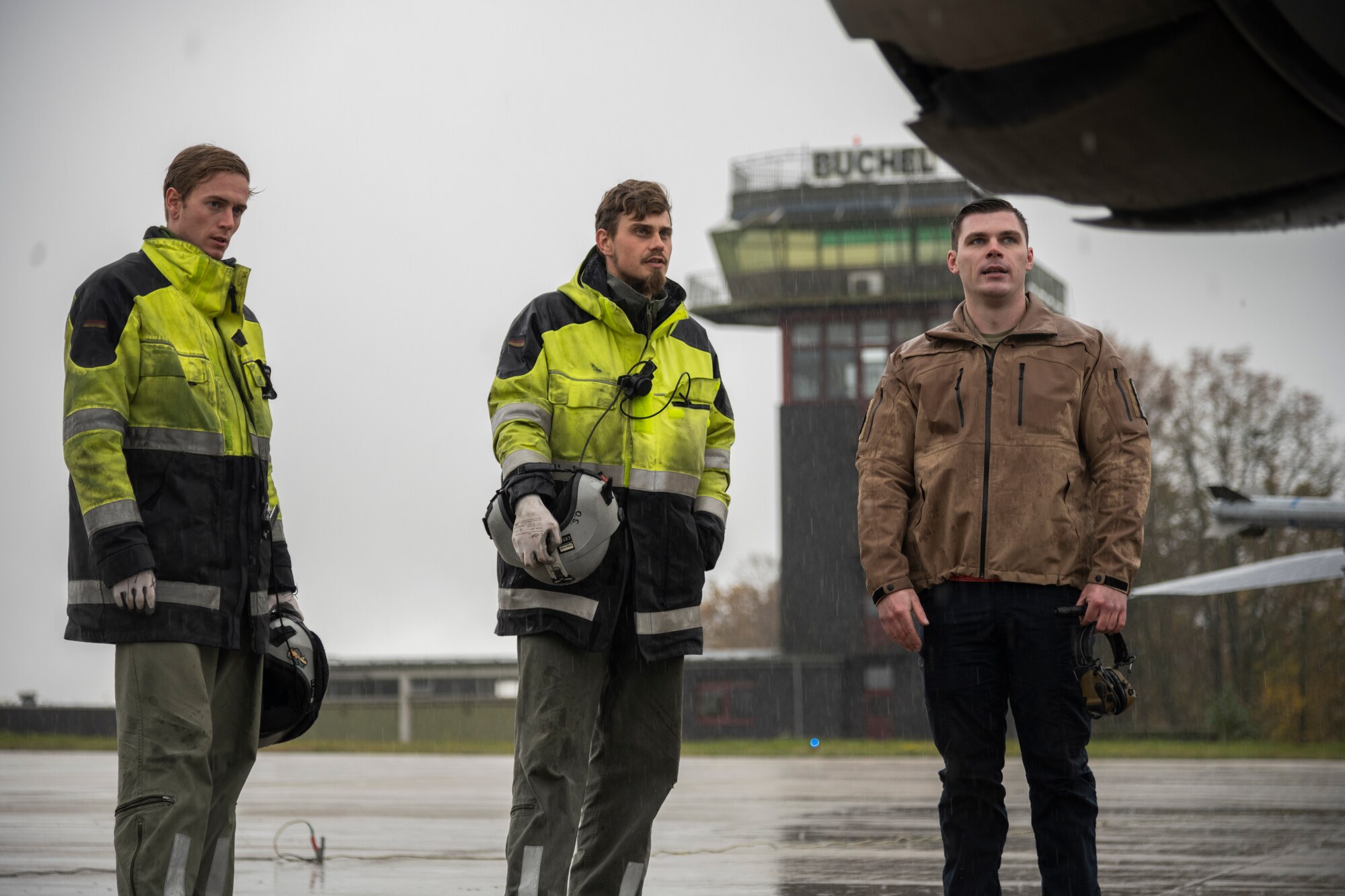 U.S. Air Force Staff Sgt. Kostyantyn Morozyuk, 52nd Aircraft Maintenance Squadron crew chief (right), instructs German Air Force aircraft maintainers on how to launch a U.S. Air Force F-16C Fighting Falcon fighter jet at Büchel Air Base, Germany, Nov. 3, 2021. Throughout the exercise, Airmen were given the opportunity to teach their host nation partners about the aircraft that they dedicate so many hours to, while also having the opportunity to learn about the German Tornado aircraft. (U.S. Air Force photo by Senior Airman Ali Stewart)