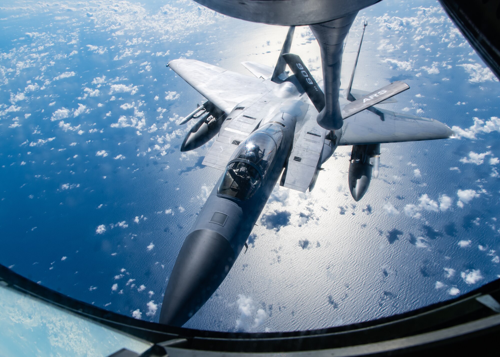 A photo of an F-15C Eagle receiving fuel from a KC-135 Stratotanker