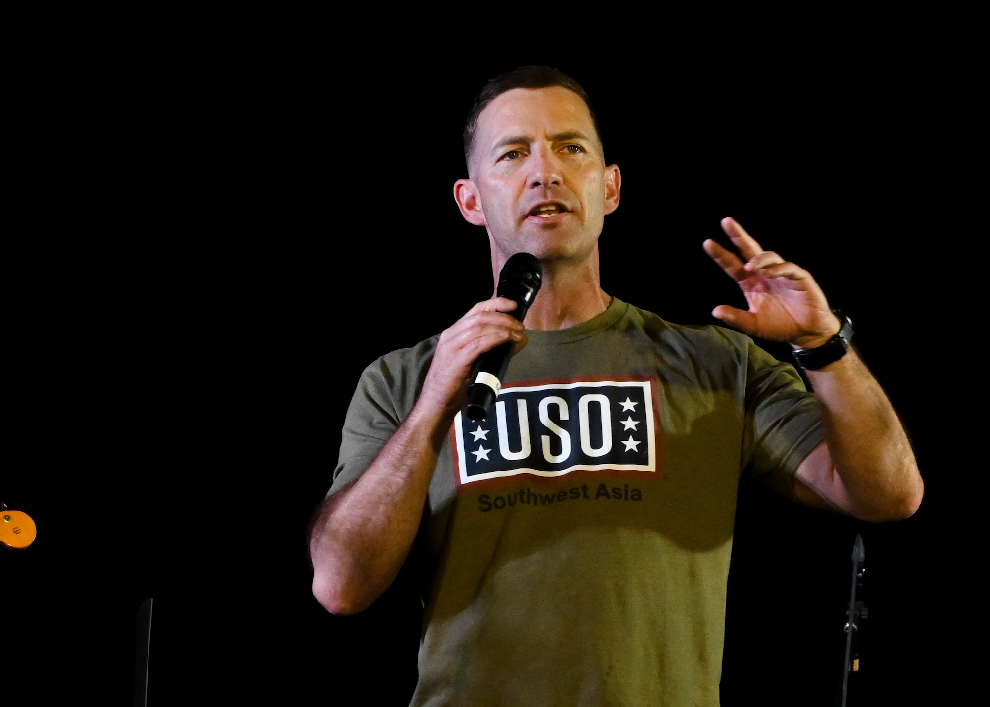 U.S. Air Force Brig. Gen. Robert Davis, 378th Air Expeditionary Wing commander, offers remarks in between sets of a U.S. Air Forces Central Band concert at Prince Sultan Air Base, Kingdom of Saudi Arabia, Oct. 15, 2021. The 378th Air Expeditionary Wing hosted two nights of performances in recognition and celebration of the base’s accomplishments throughout the past summer. (U.S. Air Force photo by Capt. Rachel Buitrago)