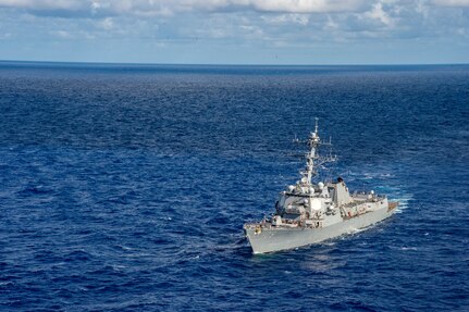 The polar icebreaker USCGC Healy (WAGB 20) and the Arleigh Burke-class guided-missle destroyer USS Jason Dunham (DDG 109) conduct a passing exercise. Healy's deployment demonstrates the U.S. commitment to ensuring a safe and secure Arctic as teh cutter crew is deployed for four and a half months to conduct operational ice testing, strengthen relationships with partner nations, project U.S. presence, and protect U.S. sovereignty rights.