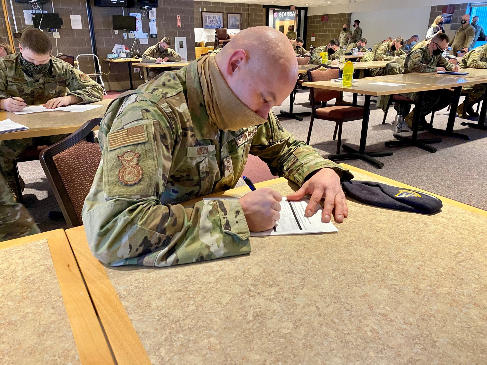 U.S. Air Force Chief Master Sgt. Jozef Miketin conducts outprocessing actions prior to deploying in support of the 2021 Presidential Inauguration in Washington D.C., Jan. 16, 2021. (U.S. Air National Guard photo by Audra Flanagan)