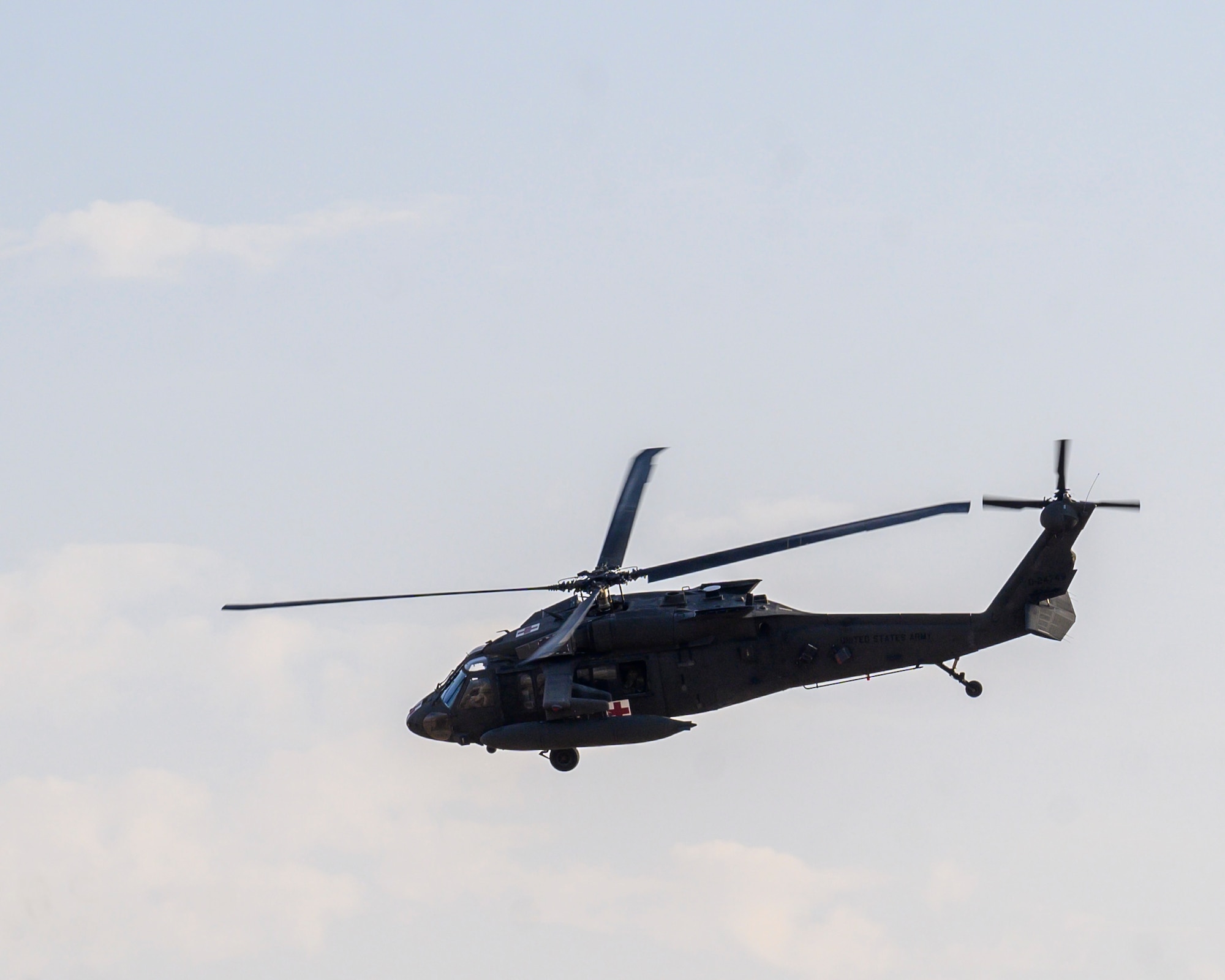 A U.S. Army UH-60 Black Hawk simulates transporting a mock victim for medical evacuation during a mass casualty and missile defense exercise at Prince Sultan Air Base, Kingdom of Saudi Arabia, Oct. 28 2021.