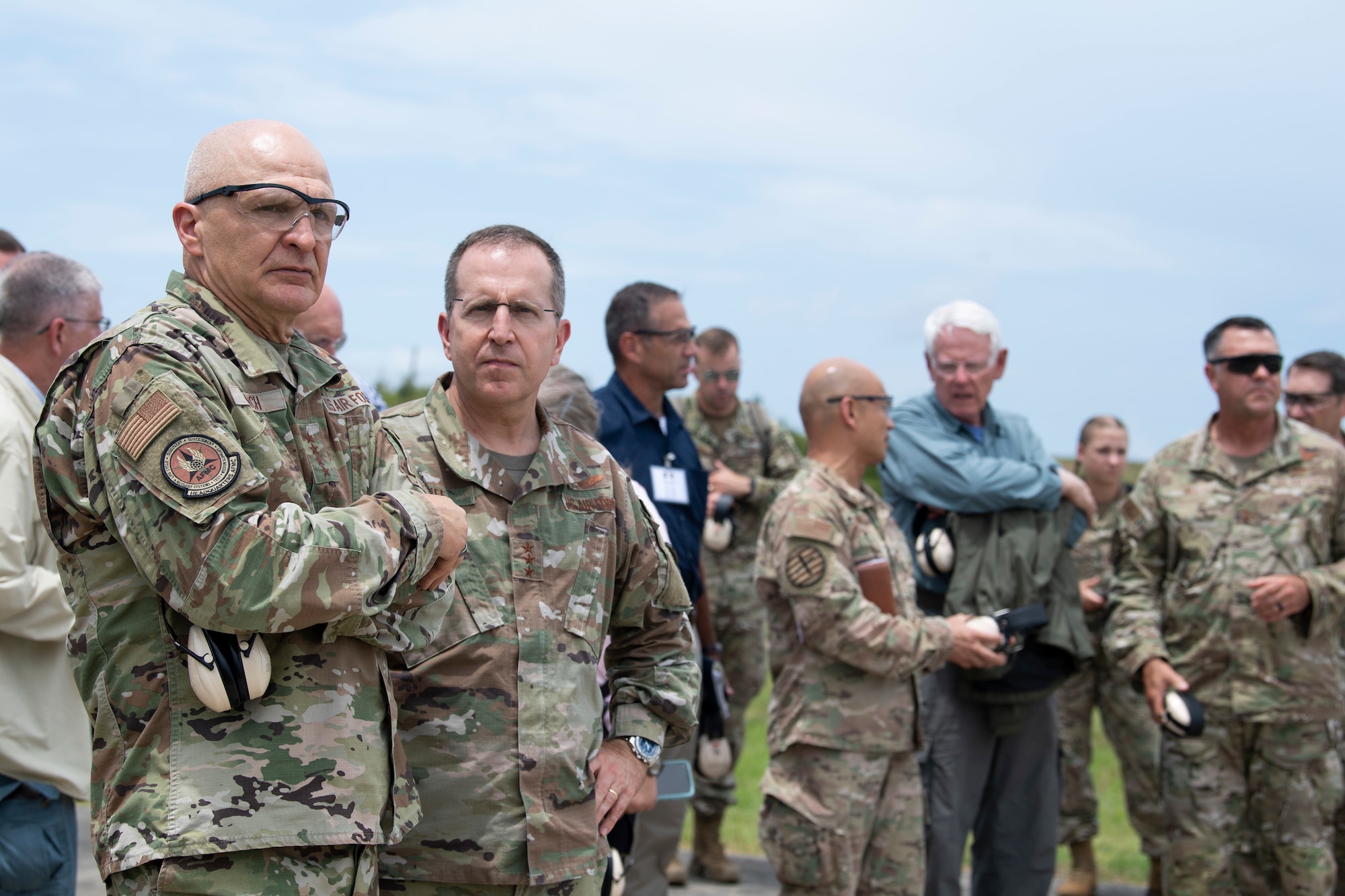 (Left) General Arnold Bunch Jr., Air Force Materiel Command commander, and Lt. Gen. Jim Slife, Air Force Special Operations Command commander, discuss AFSOC’s capabilities during a Forward Area Refueling Point demonstration with two USMC F-35B Lightning II’s during  AFSOC’s Technology, Acquisition, and Sustainment Review at Duke Field, Florida, July 21, 2021. (U.S. Air Force photo by Staff Sgt. Janiqua P. Robinson)
