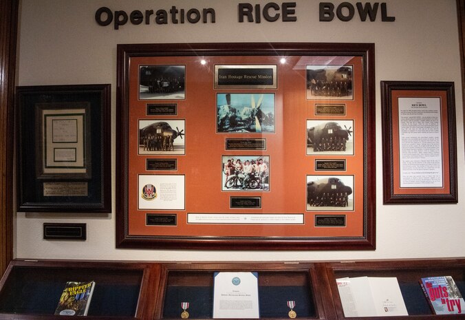 In the halls of the Air Force Special Operations Command (AFSOC) headquarters building there is a memorial capturing the history of OPERATION RICE BOWL, at Hurlburt Field, Florida. During the interview, Lt. Gen. Jim Slife, AFSOC commander, talked about the importance of this first ‘inflection’ point in special forces history and how the failure of this mission highlighted the need for AFSOC. (U.S. Air Force photo by Staff Sgt. Janiqua P. Robinson)