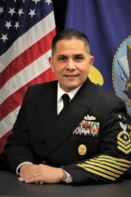 Official portrait of Command Master Chief Johannes J. Gonzalez