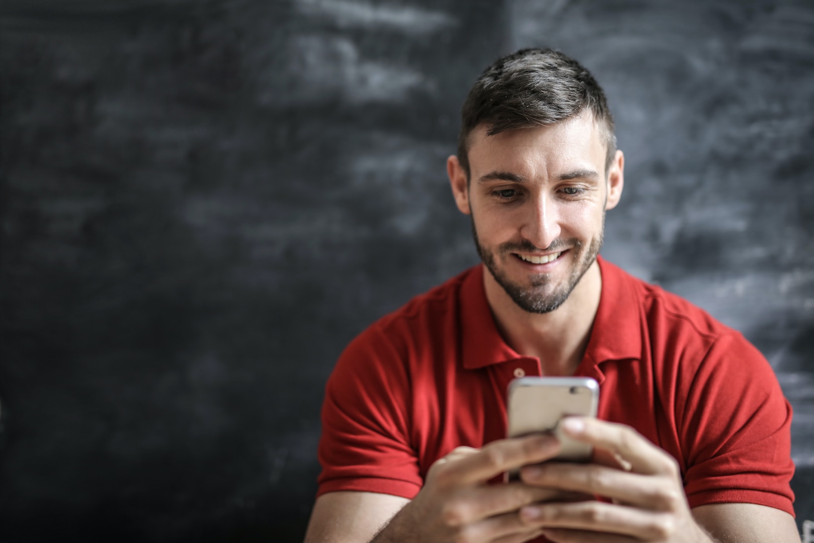 Man looks at cellphone