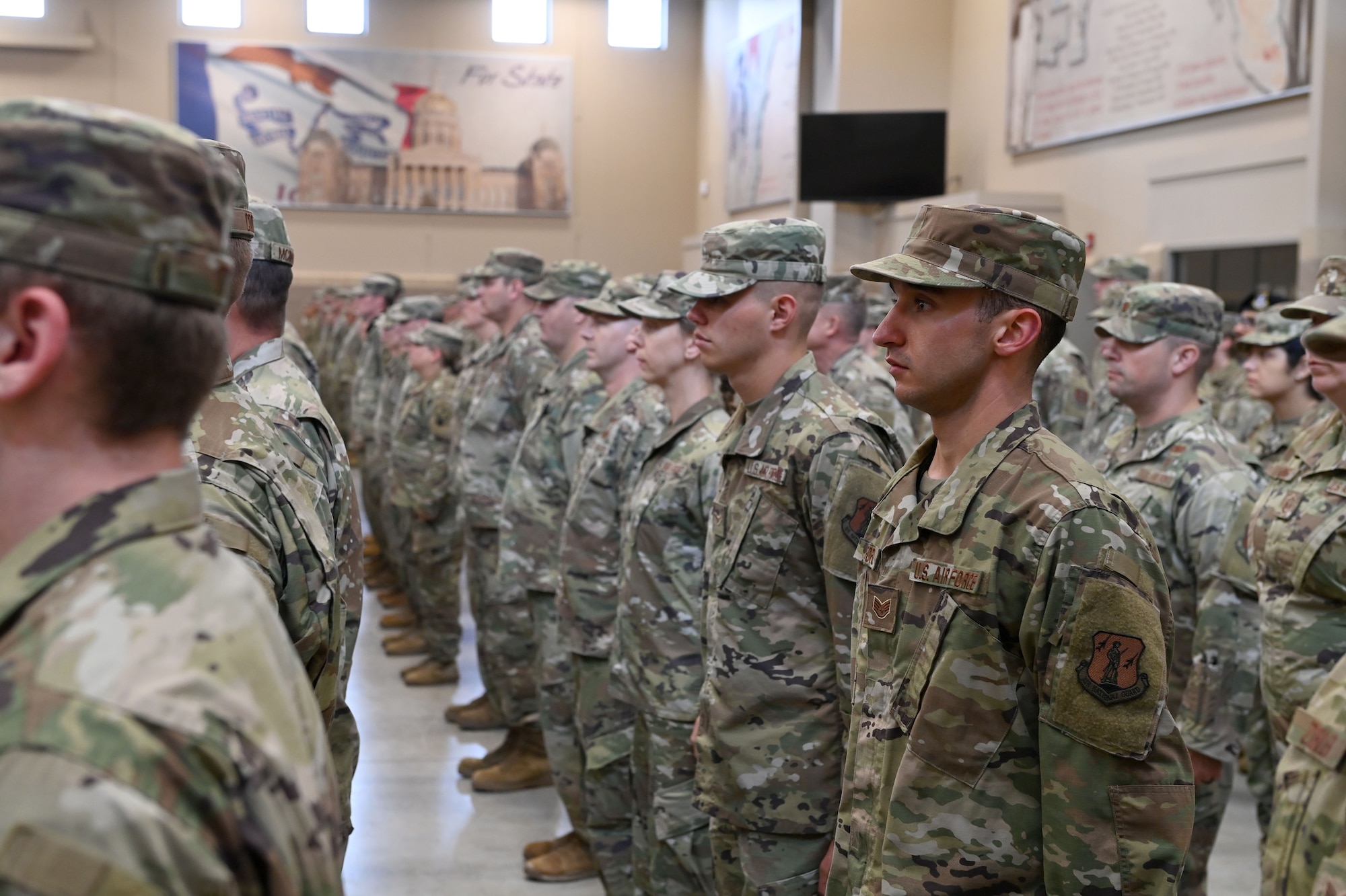132d Wing Airmen stand in formation during the TAG's Annual Retreat Ceremony, May 28, 2021 at Camp Dodge in Johnston, Iowa. Air and Army National Guard units from around the state of Iowa were present. (U.S. Air National Guard photo by Tech. Sgt. Michael J. Kelly)