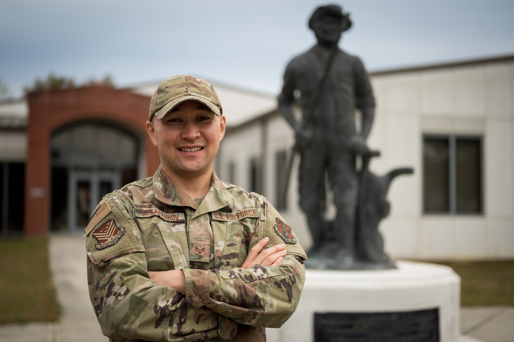 U.S. Air Force Senior Airman Asylbek Dzhapashov, personnelist with the 116th Air Control Wing, Georgia Air National Guard poses for a picture, Nov. 6, 2021.  Asylbek is a native of Kyrgyzstan who became a citizen of the United States and joined the Air National Guard. (U.S. Air National Guard photo by Capt. Ronald Cole)