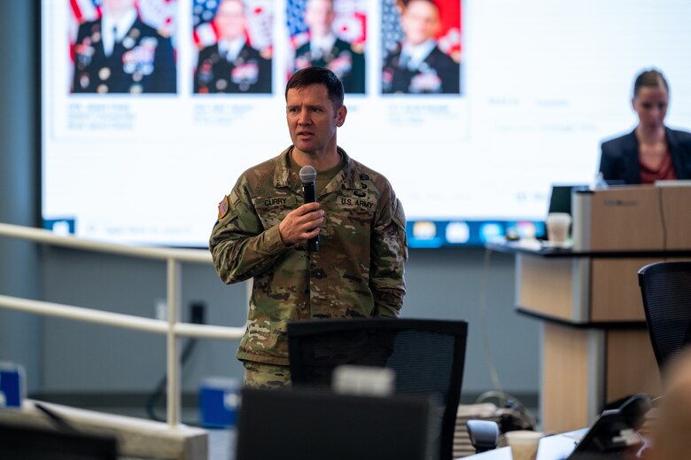 Col. Jesse Curry, Commander, Rock Island District, addresses Iowa state agency representatives at the 2021 Iowa Hybrid Partnering Meeting. The purpose of this meeting was for the four U.S. Army Corps of Engineers Districts that share borders in Iowa to meet with state agencies and speak about potential collaboration means regarding future public infrastructure projects in the state.