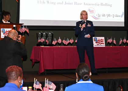 Joint Base Anacostia-Bolling Vice Commander Col. Erica Rabe speaks during the Women Veterans ROCK Women in Legendary Leadership luncheon at the National Guard Museum on Nov. 7, 2021 in Washington, D.C. The coalition of women veteran and women advocacy organizations aims to empower and encourage active military members, veterans, military spouses and widows, and young women in their local communities to become effective leaders, connecting them with mentorship and resources, and hosting a number of regular events. (U.S. Air Force photo by Staff Sgt. Kayla White)