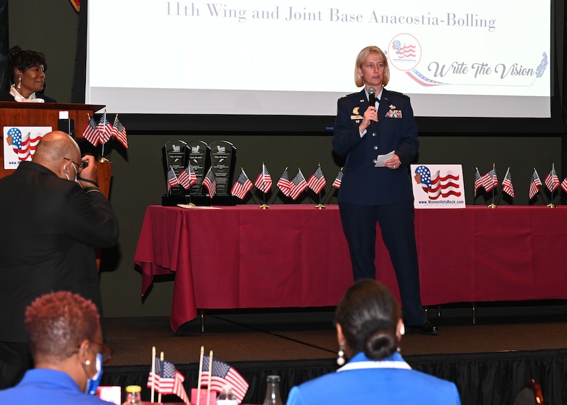 Joint Base Anacostia-Bolling Vice Commander Col. Erica Rabe speaks during the Women Veterans ROCK Women in Legendary Leadership luncheon at the National Guard Museum on Nov. 7, 2021 in Washington, D.C. The coalition of women veteran and women advocacy organizations aims to empower and encourage active military members, veterans, military spouses and widows, and young women in their local communities to become effective leaders, connecting them with mentorship and resources, and hosting a number of regular events. (U.S. Air Force photo by Staff Sgt. Kayla White)