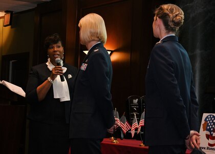 The Women Veterans ROCK National Campaign Chair Deborah Harmon-Pugh introduces Joint Base Anacostia-Bolling Commander Col. Cat Logan and Vice Commander Col. Erica Rabe during the Women Veterans ROCK Women in Legendary Leadership luncheon at the National Guard Museum on Nov. 7, 2021 in Washington, D.C. The coalition of women veteran and women advocacy organizations aims to empower and encourage active military members, veterans, military spouses and widows, and young women in their local communities to become effective leaders, connecting them with mentorship and resources, and hosting a number of regular events. (U.S. Air Force photo by Staff Sgt. Kayla White)
