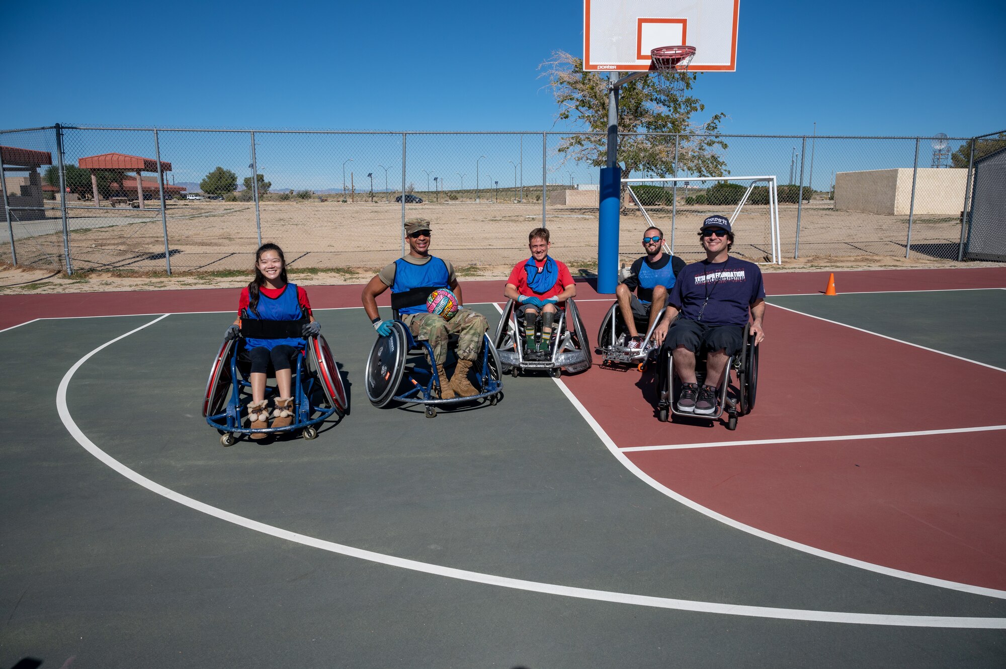 Airmen from Edwards Air Force Base participate in a game of wheelchair rugby during a National Disability Employment Awareness Month observance at the Rosburg Fitness Center, Oct. 29, at Edwards Air Force Base, California.