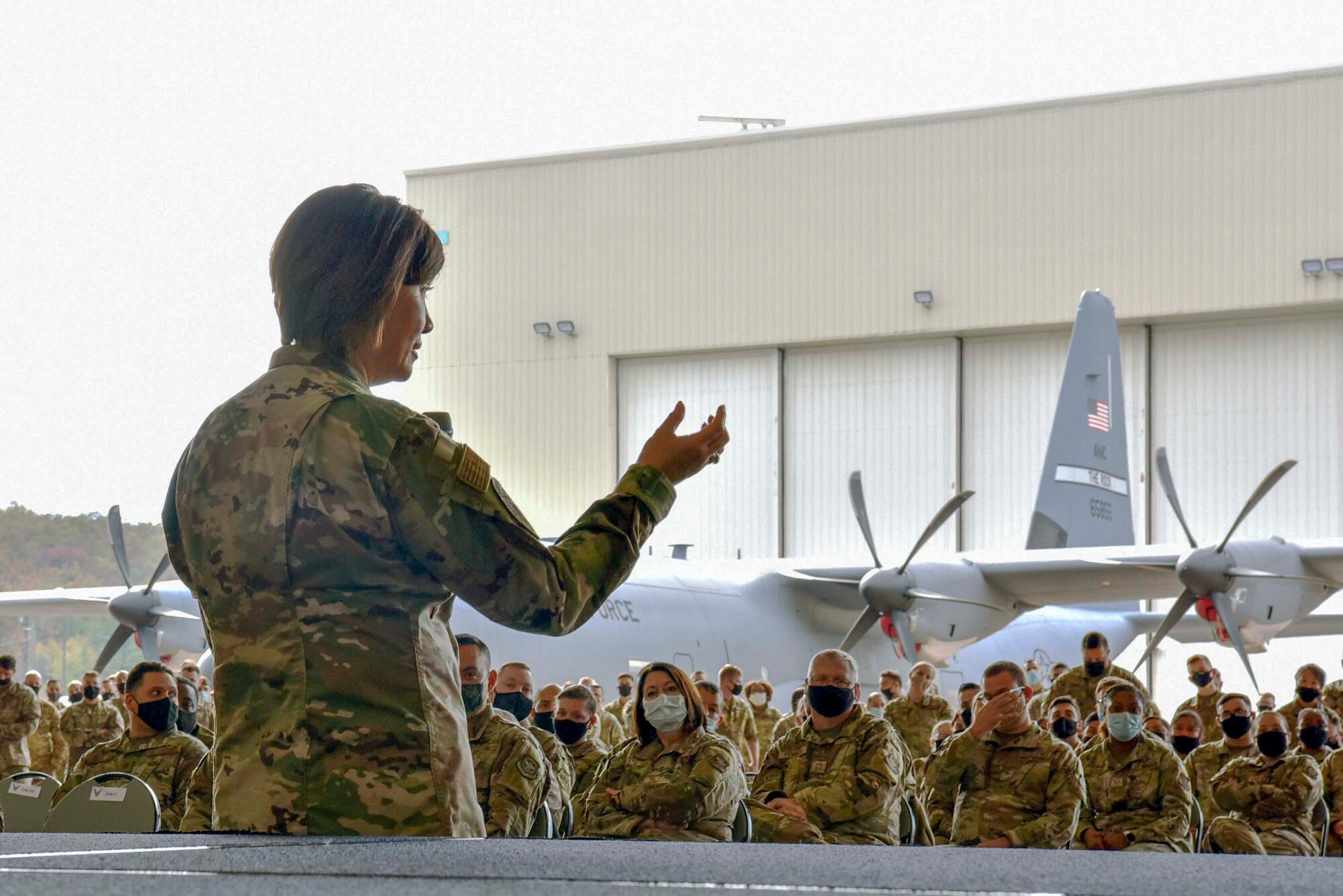 A person speaks to an audience