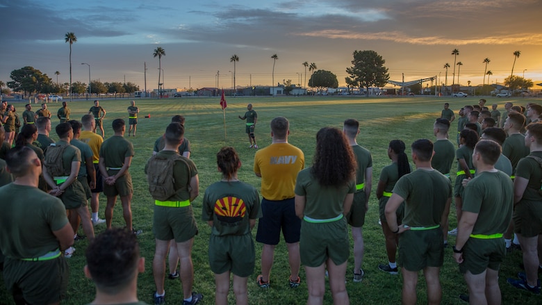 U.S. Marine Corps Sgt. Maj. Luis A. Galvez, sergeant major, Headquarters and Headquarters Squadron (H&HS), speaks to Marines after a unit run at Marine Corps Air Station Yuma, Ariz., Nov. 9, 2021. The run was in celebration of the 246th Marine Corps birthday and was intended to strengthen esprit de corps and camaraderie amongst Marines and Sailors of H&HS. (U.S. Marine Corps photo by Sgt. Jason Monty)