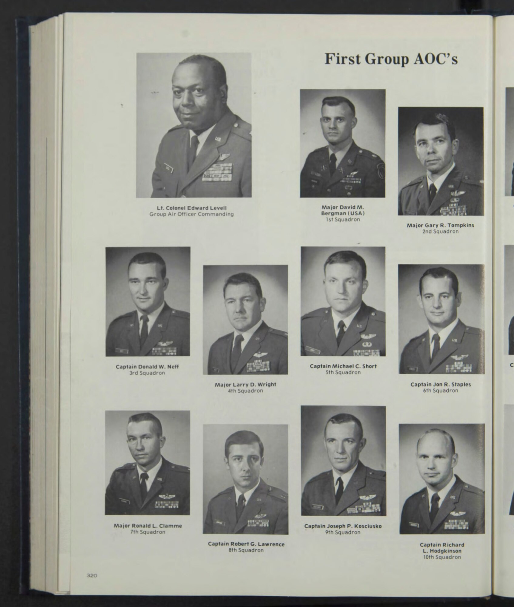 A photo of a yearbook with various people wearing military uniforms.
