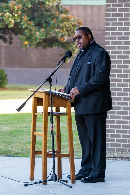 Command Sergeant Major (retired) Mathew Calhoun Sr. was the guest speaker for Norfolk Naval Shipyard’s annual Veterans Day Fall-In for Colors. He shared a personal story from his time with the U.S. Army, speaking of an individual in his command, someone he referred to as Specialist Smiley in respect of the individual’s family, whom would often come to him with ambition to join the elite company of soldiers on the ground in Iraq.