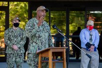 “Being in our nation’s armed forces provides a tremendous sense of camaraderie and teamwork, of serving a cause greater than ourselves as individuals,” said Norfolk Naval Shipyard (NNSY) Business and Strategic Planning Officer Cmdr. Lawrence Brandon during the annual Veterans Day Fall-In for Colors Nov. 10. “Whether in times of conflict or peace, so many have stepped up without a moment’s hesitation to dig deep and answer the call, sometimes even paying the ultimate sacrifice, doing so with honor and leadership, and constantly exhibiting service before self.  Our shipyard motto of ONE MISSION – ONE TEAM is a mindset many of our veterans have been practicing for years and even decades, working alongside their military brothers and sisters in pursuit of a vital and shared goal.”