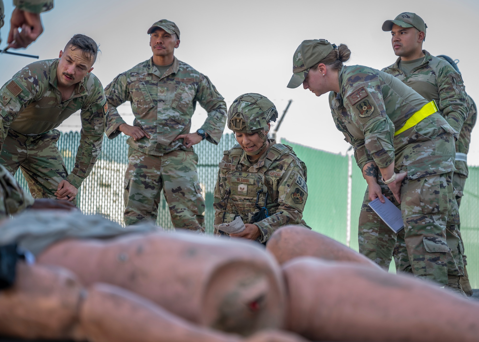 Staff Sgt. Jennifer Aleman, assigned to the 386th Expeditionary Security Forces Squadron, provides medical aid to a training dummy during Tactical Combat Casualty Care training at Al Jaber Air Base, Kuwait, Nov. 5, 2021.