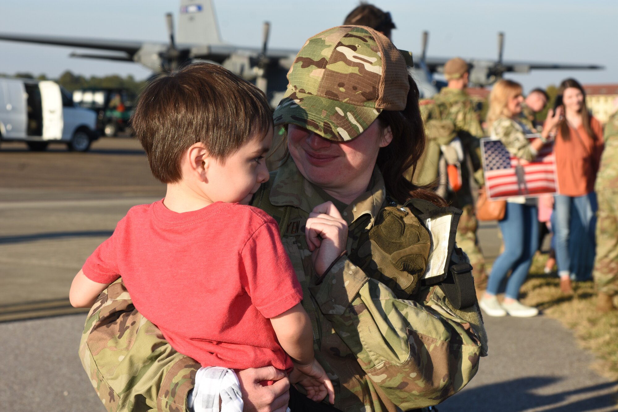 A 908th Airlift Wing Airman greets a loved one here Wednesday, 10 November, after returning from a four-month deployment to Southwest Asia. The Airman was one of nearly 300 wing Airman who executed the largest deployment in wing history over the spring and summer of 2021.