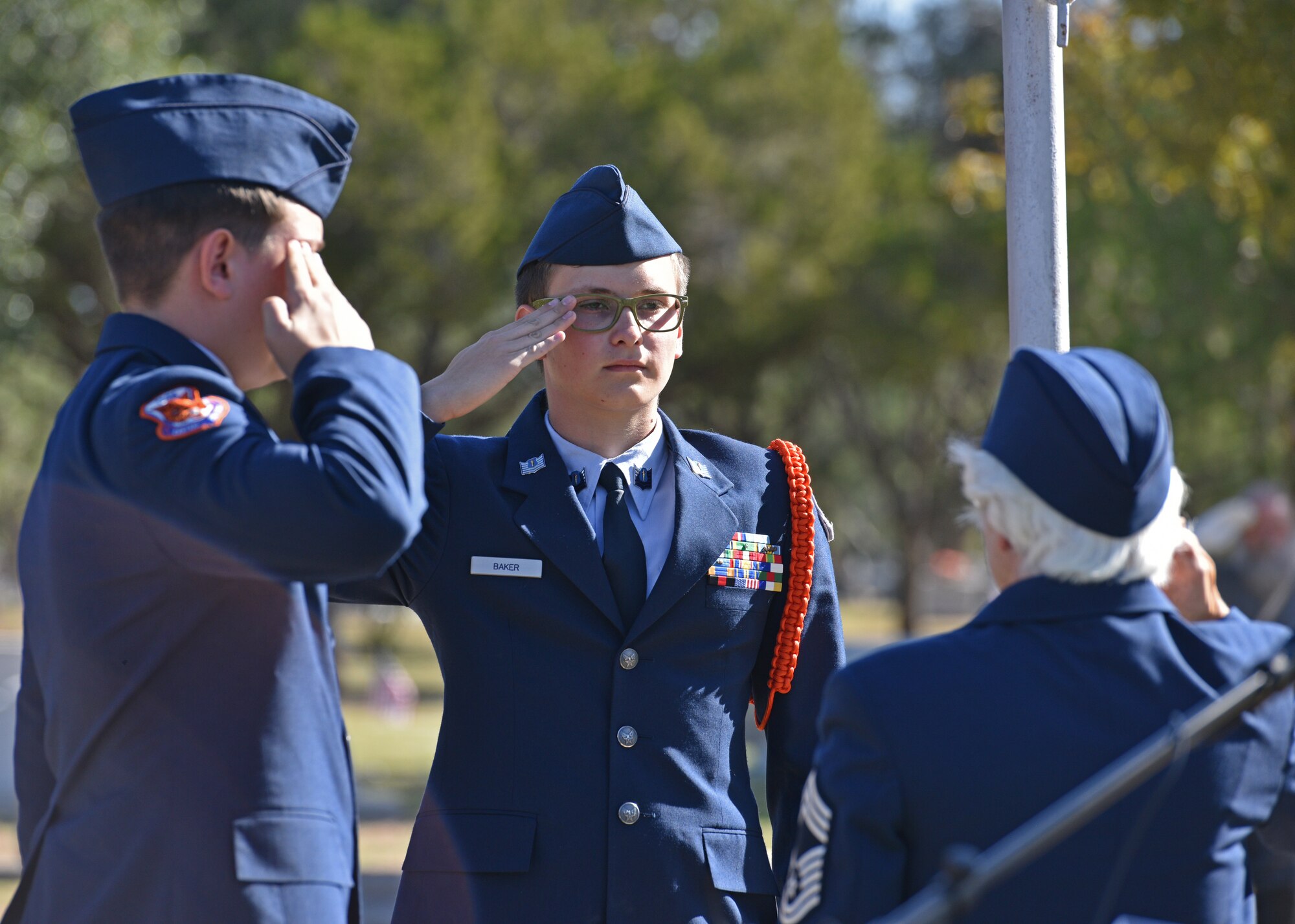 Members of Central High School Junior Reserve Officer Training Corps Color Guard salute during the Veteran’s Day ceremony at the Fairmount Cemetery in San Angelo, Texas, Nov. 11. ROTC is offered at more than 1,100 colleges and universities across the country. (U.S. Air Force photo by Senior Airman Ashley Thrash)