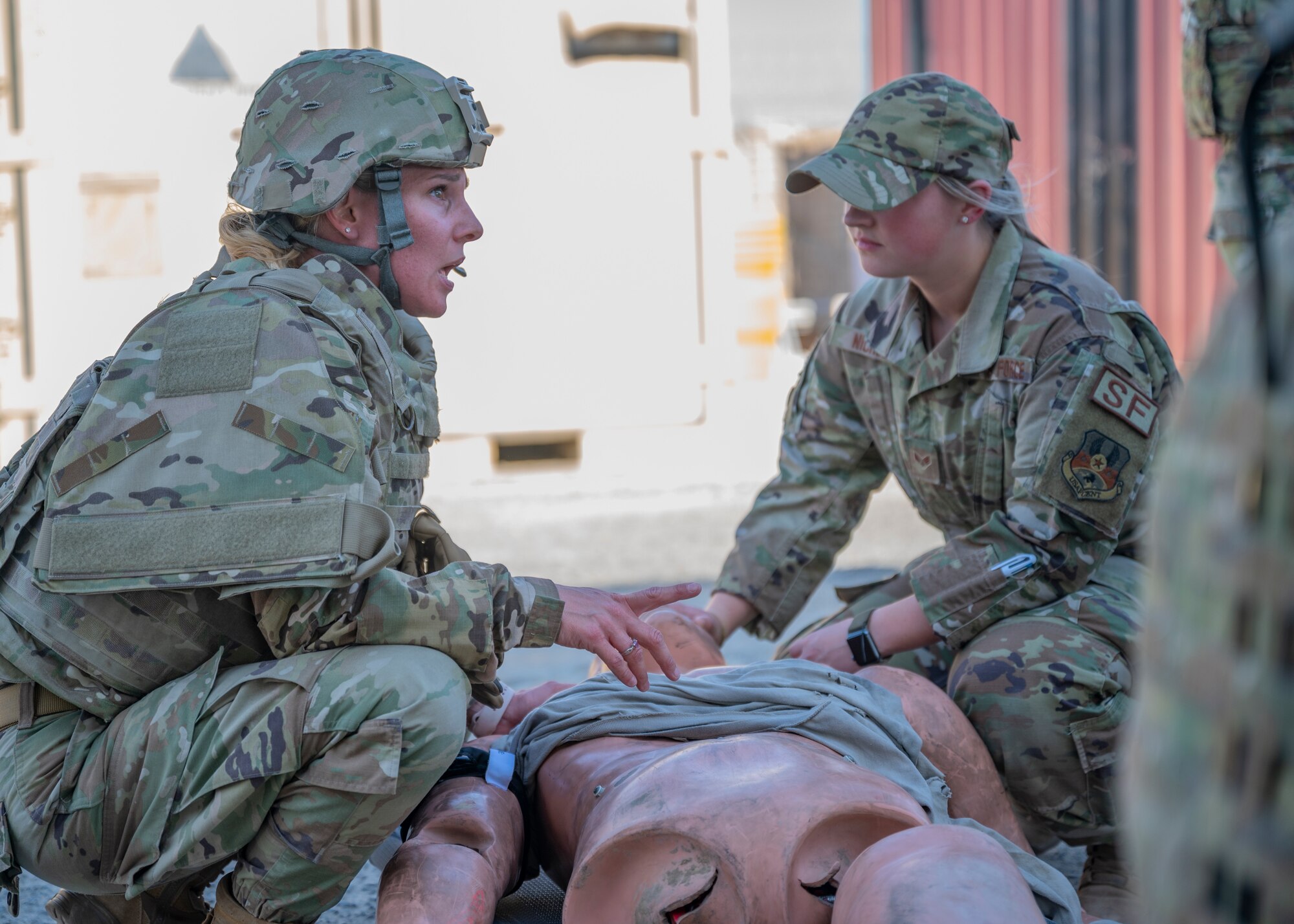 Tech. Sgt. Chelsea Munoz, assigned to the 407th Expeditionary Support Squadron, provides medical aid to a training dummy during Tactical Combat Casualty Care training at Al Jaber Air Base, Kuwait, Nov. 5, 2021.