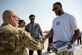 Tracy McGrady and Jalen Rose answer questions from service members in the Coalition Compound Theater, Nov. 11, 2021 at Al Udeid Air Base, Qatar.