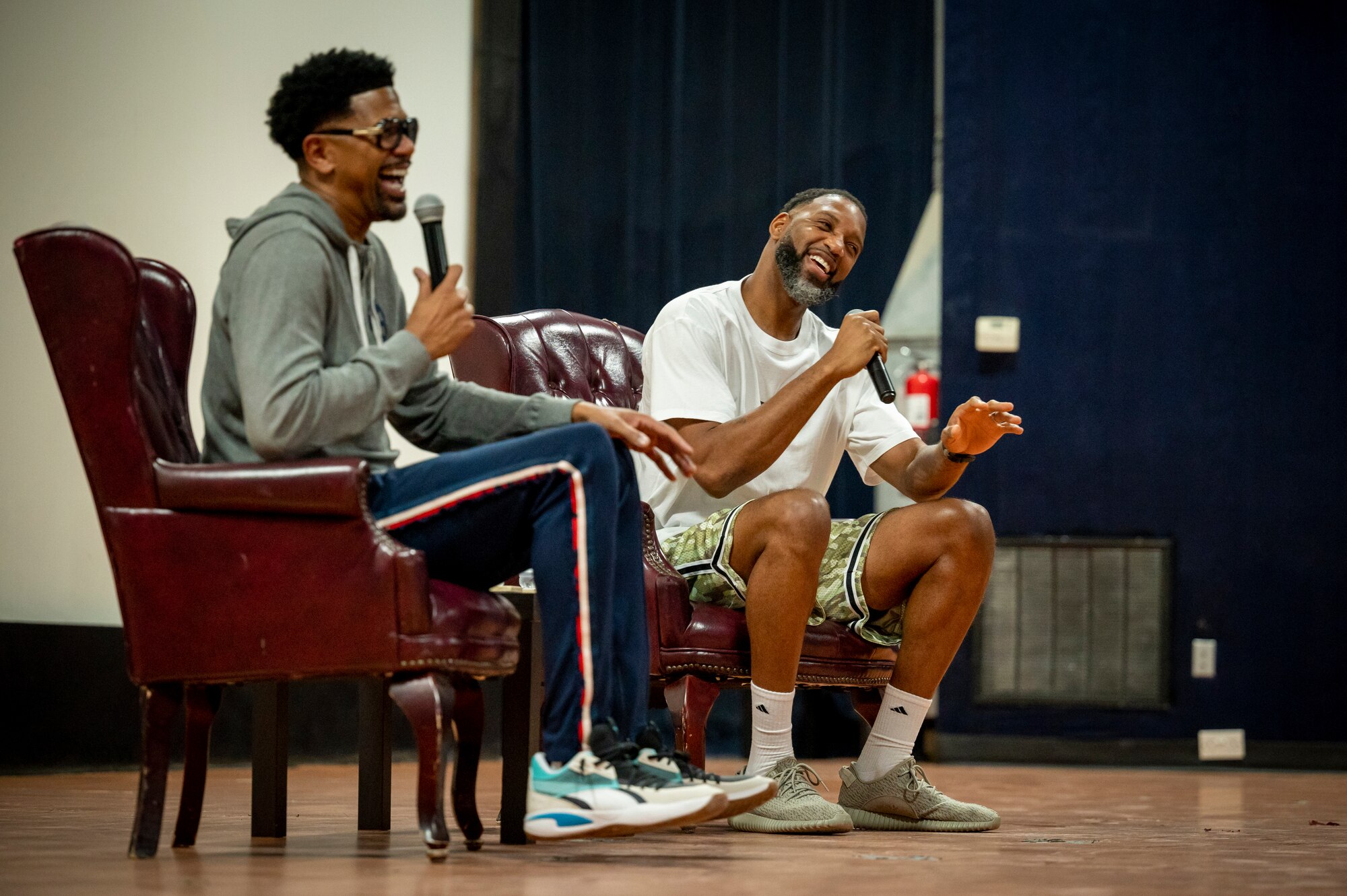 Tracy McGrady and Jalen Rose answer questions from service members in the Coalition Compound Theater, Nov. 11, 2021 at Al Udeid Air Base, Qatar.