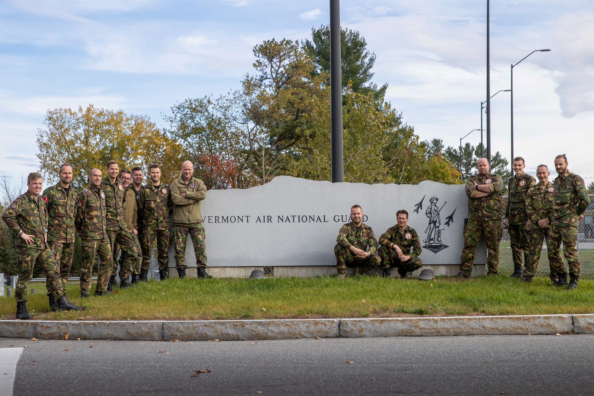 Members of the Royal Netherlands Air Force stand for a group portrait prior to their departure from the Vermont Air National Guard base.