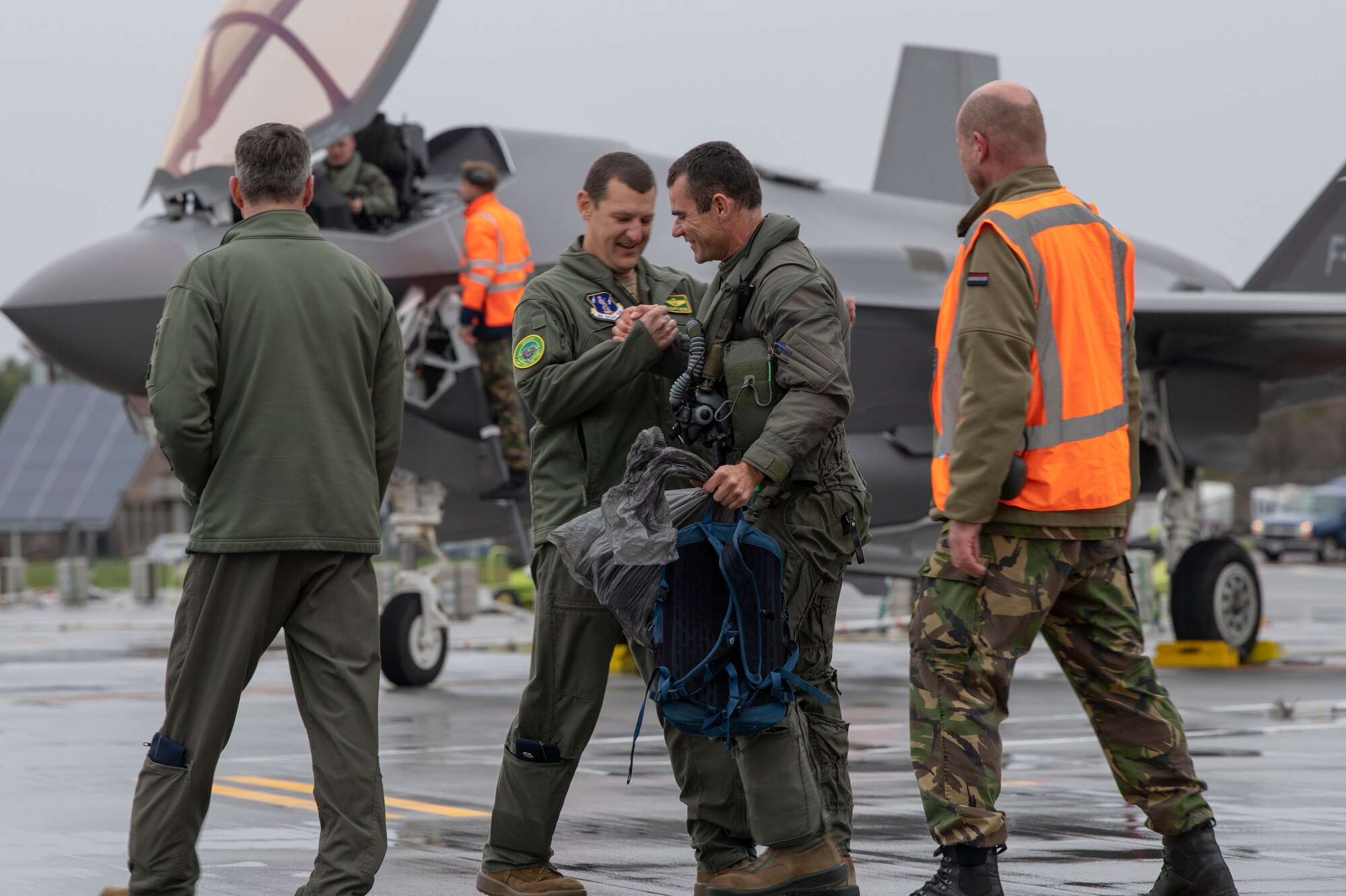 U.S. Air Force Lt. Col. Anthony Marek, deputy commander, 158 Operations Group, Vermont Air National Guard, welcomes Maj. Pascal "Smiley," F-35 pilot, Royal Netherlands Air Force, to the Vermont Air National Guard base.