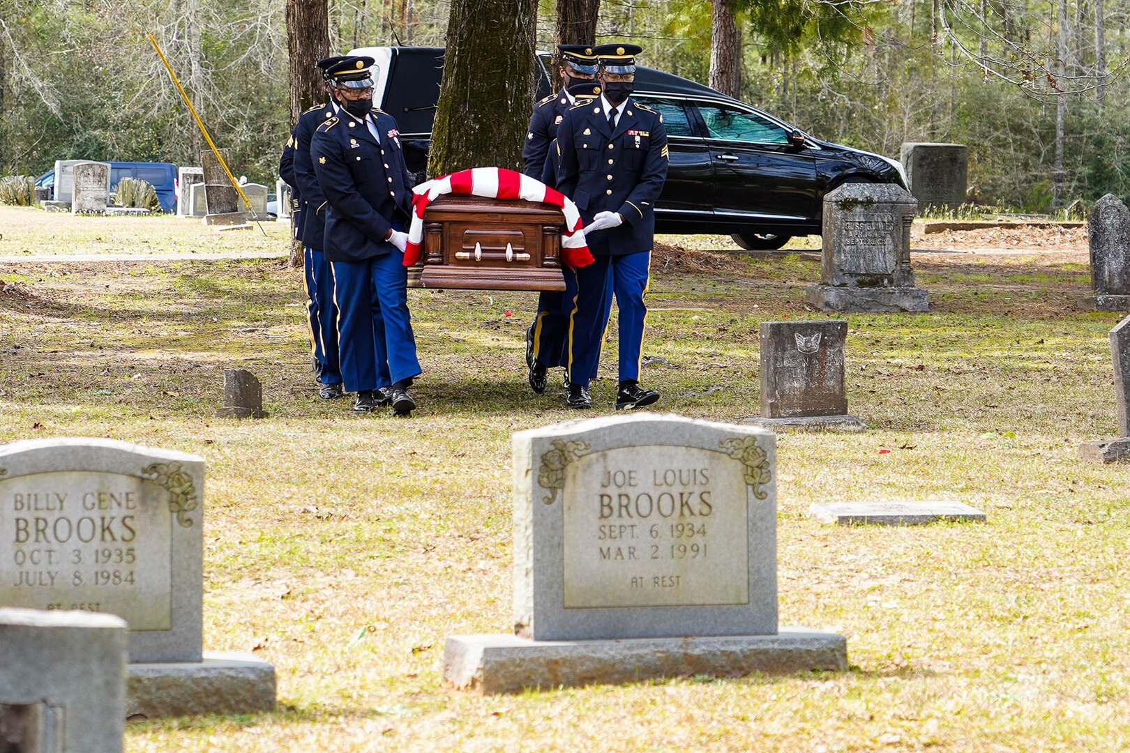 A Louisiana National Guard Military Funeral Honors Team escorts a fallen Soldier during his internment ceremony, March 13, 2021. Over the last year alone, the team proudly rendered honors at more than 1,500 veterans’ funerals, honoring them for their service.