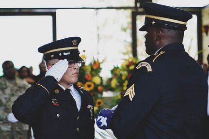 A Louisiana National Guard Military Funeral Honors Team pays respects during a fallen Soldier’s military service, July 24, 2021.