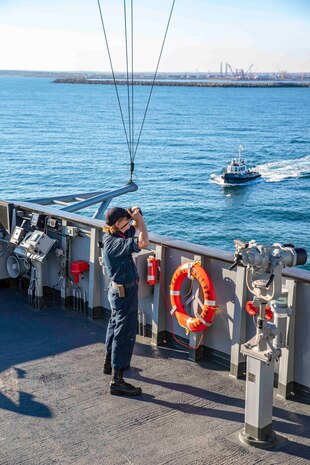 Military Sealift Command Ordinary Seaman Lane Canada stands bridge watch aboard the Blue Ridge-class command and control ship USS Mount Whitney (LCC 20) as the ship makes port in Constanta, Romania, November 12, 2021.