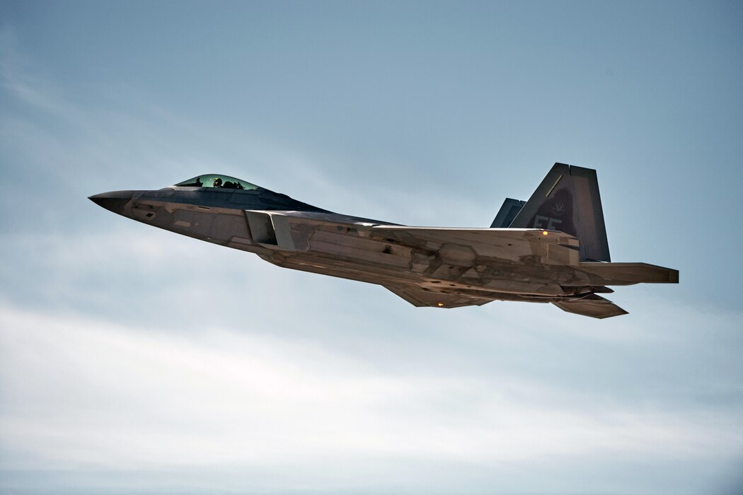 A F-22 Raptor flying in sky.