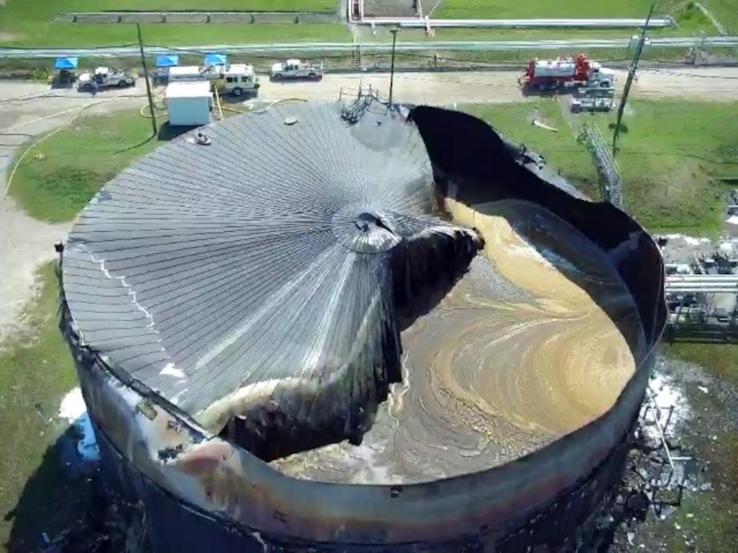 A drone surveillance photo of a Chevron oil storage tank that caught on fire in Pasadena, Texas, Aug. 18, 2020. There were no injuries or deaths, but the fire burned through the steel tank roof and forced the temporary closure of the Houston Ship Channel. U.S. Coast Guard photo by Chief Petty Officer Cameron Steinmetz and Petty Officer 3rd Class Tim Loveday.