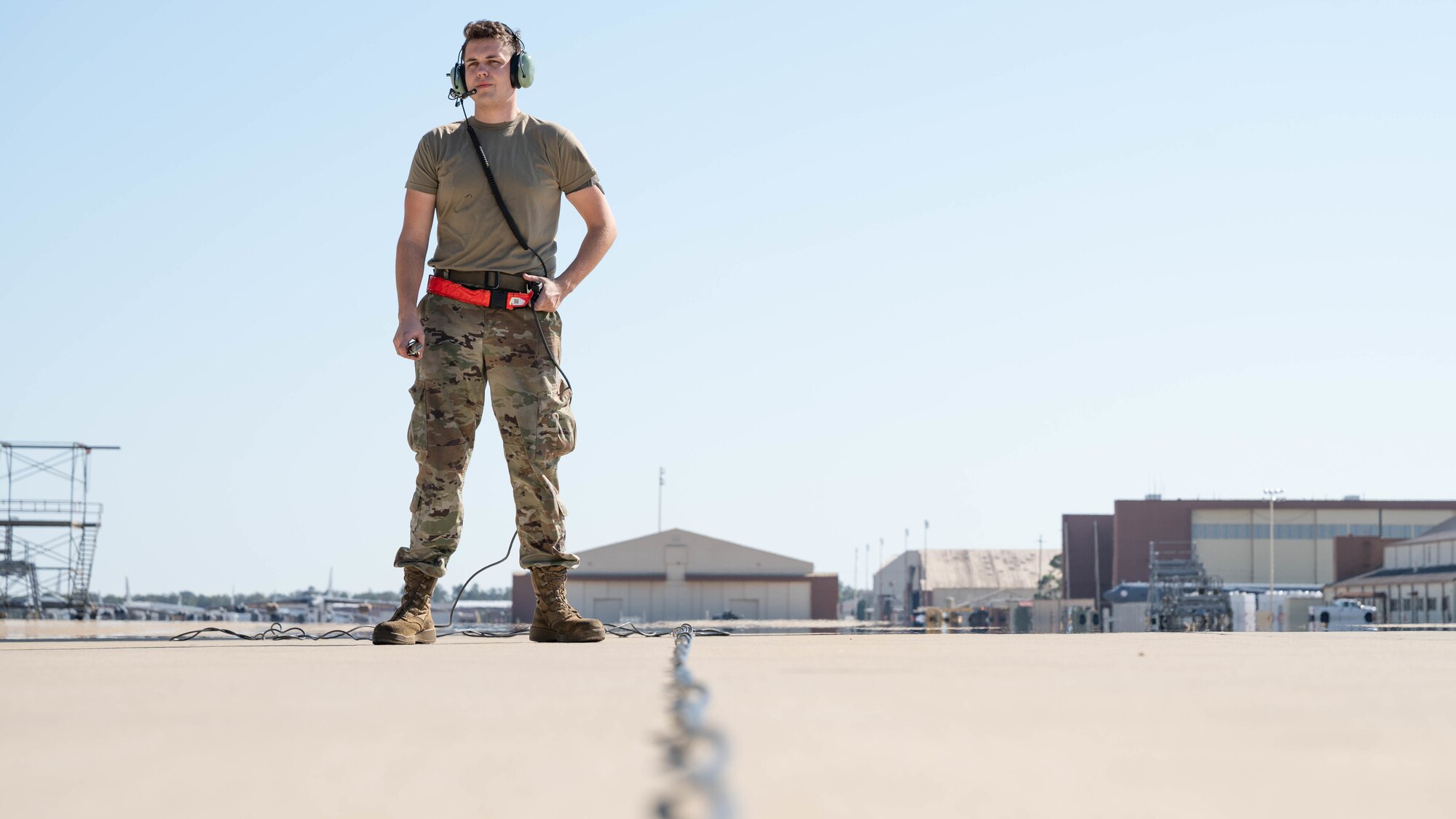 Airman 1st Class Noah Maurer, 2nd Aircraft Maintenance Squadron crew chief, communicates with aircrew inside a B-52 Stratofortress during Global Thunder 22 at Barksdale Air Force Base, Louisiana, Nov. 2, 2021.