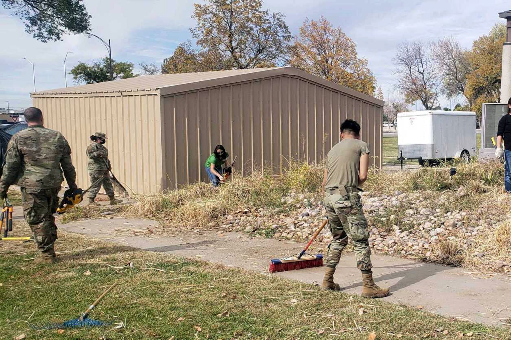 Members of Hill’s Airman’s Attic Council and Airman and Family Readiness Center staff removed more than 500 pounds of unwanted weeds and shrubs Oct. 22, 2021, from the area surrounding building 150 where the Airman’s Attic is located at Hill Air Force Base.